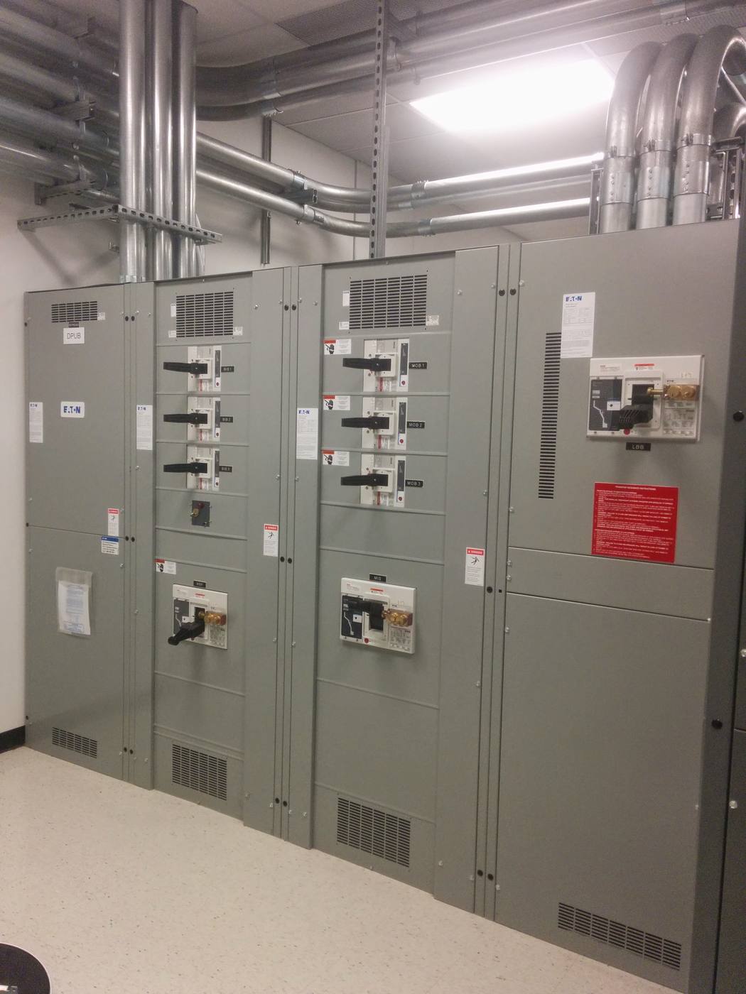 UPS distribution switchboard with breaker sections and metering.